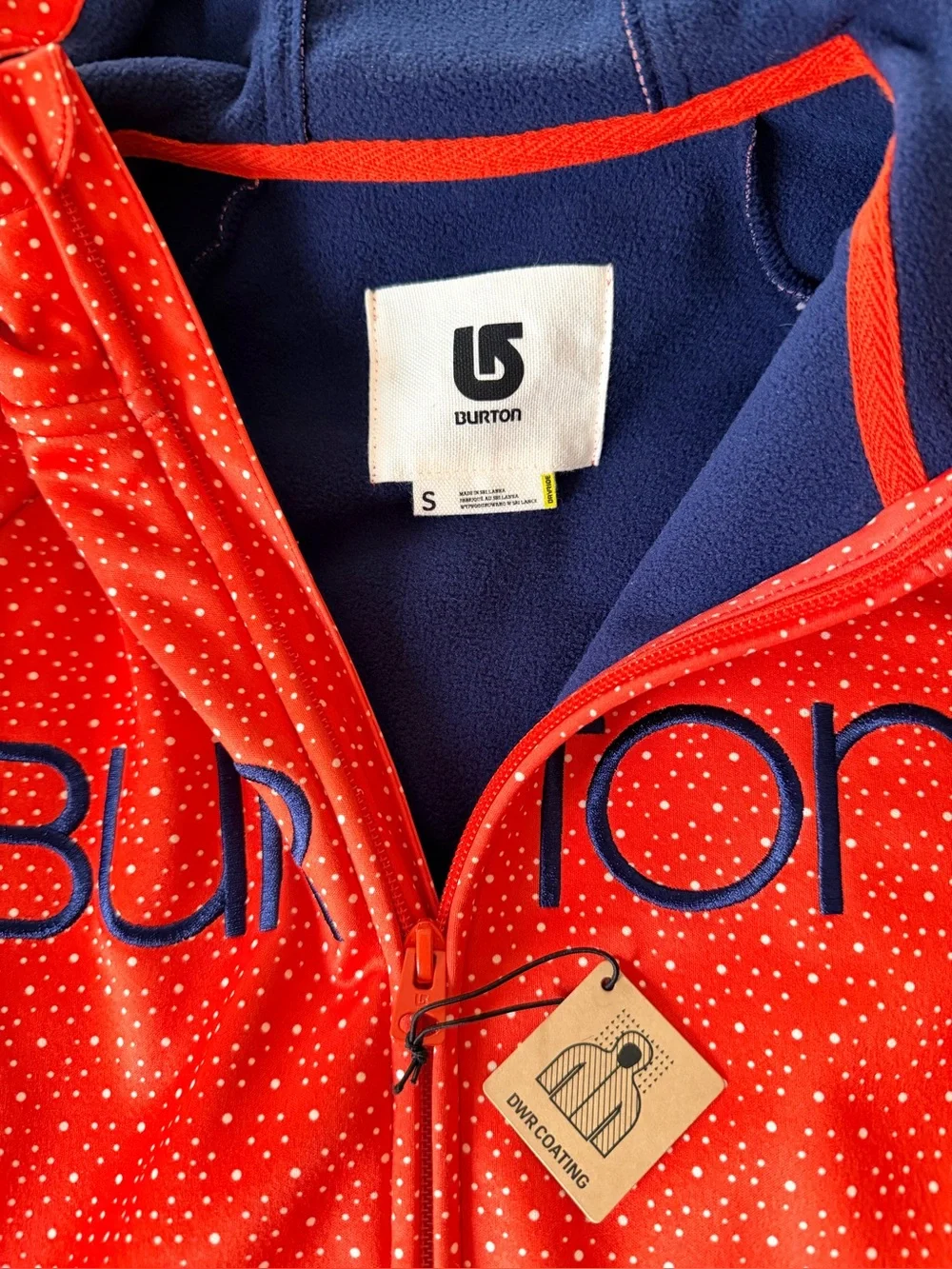 Burton Womens Orange and Navey Hooded Zip-Up Puffer Jacket with Micro Dot Print